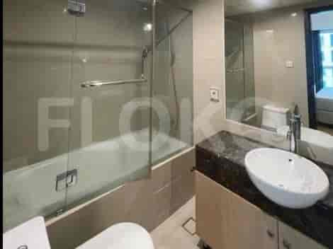 A modern bathroom featuring a bathtub and shower.
