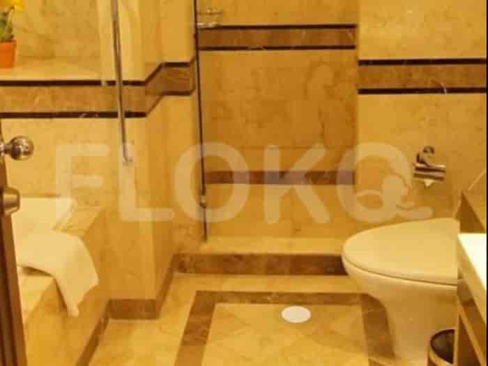 Bathroom with a shower stall and toilet.