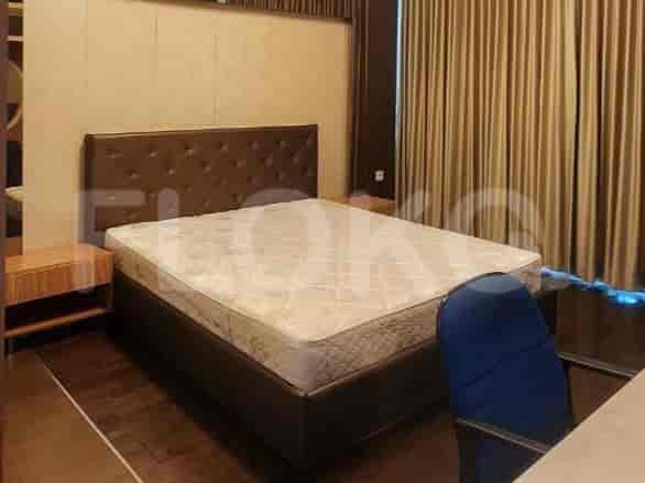 Comfortable bedroom with a large bed and bedside tables.