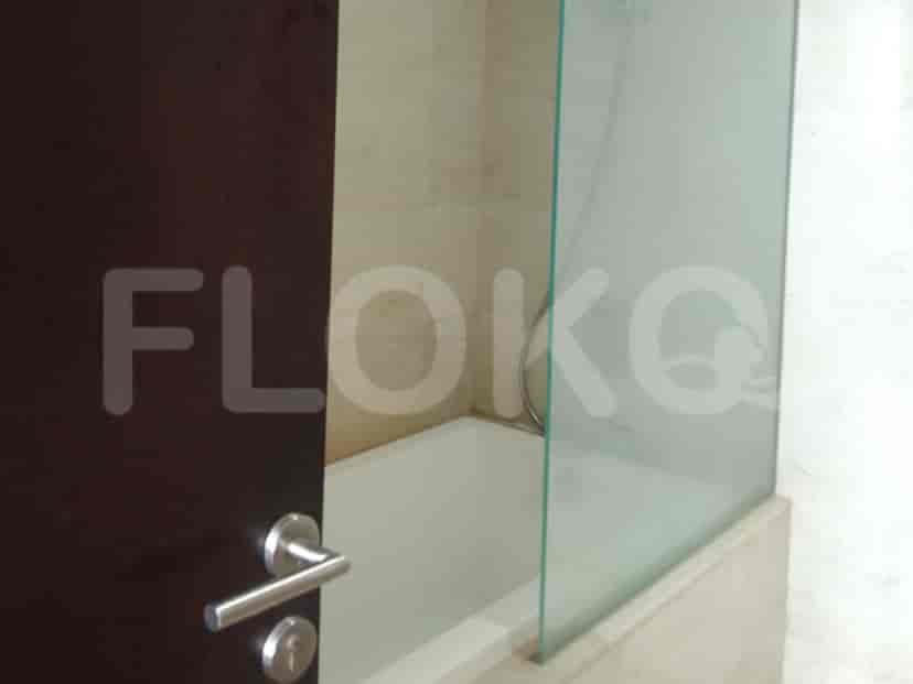 Bathroom with a shower and a bathtub.