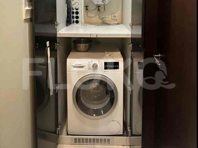 Laundry room with a washing machine.