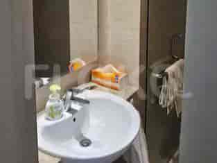 Bathroom with a sink and mirror.