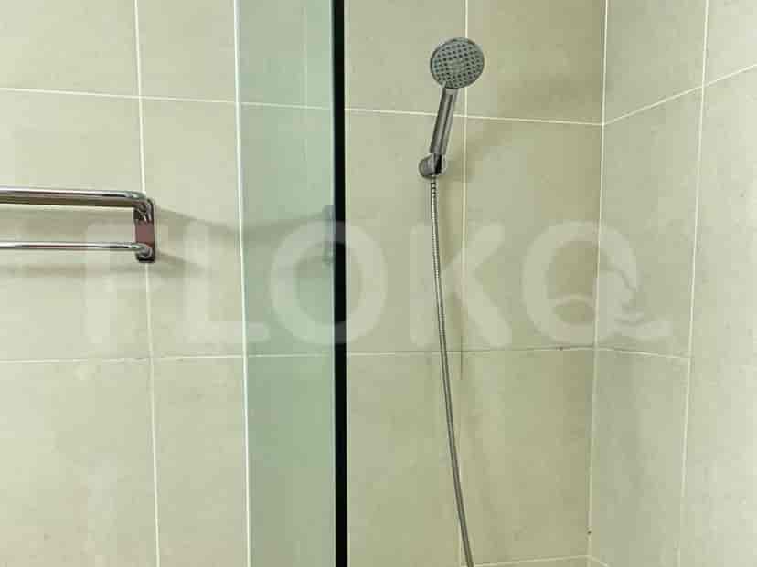 A modern bathroom with a shower.
