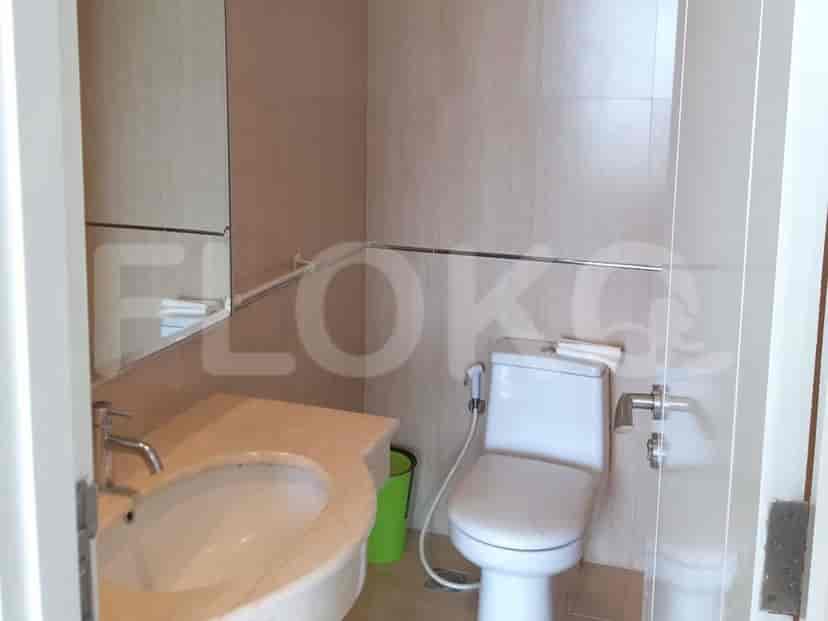 Small bathroom with a sink and toilet.