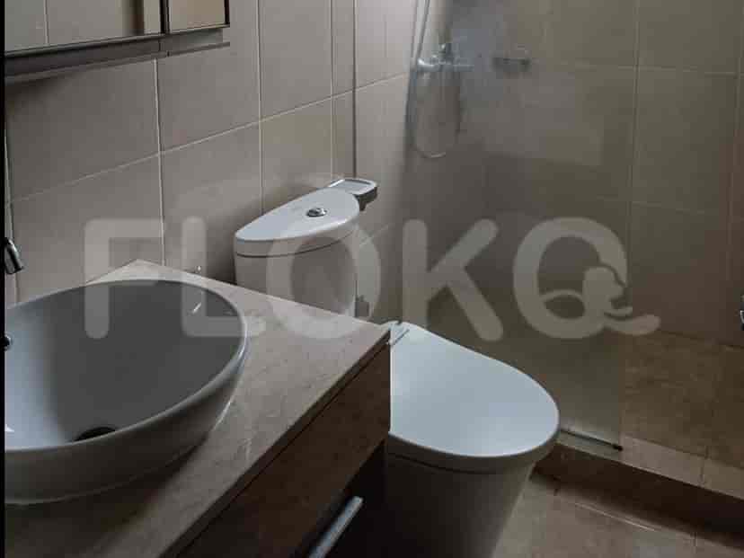 Bathroom with a toilet and a sink.
