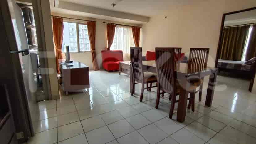 Living room and dining area with a cozy atmosphere.