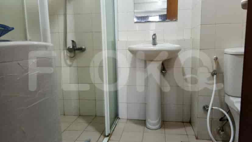 Bathroom with a sink, shower and toilet.
