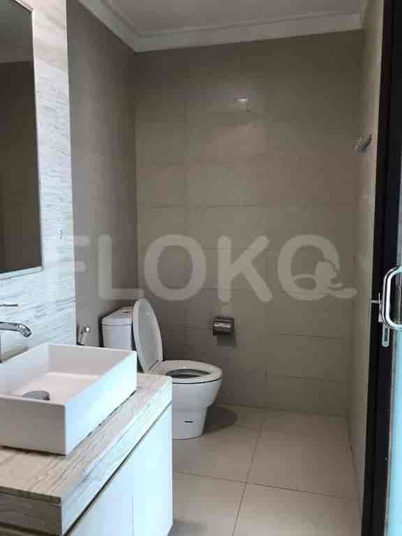 Bathroom with a toilet and a sink.