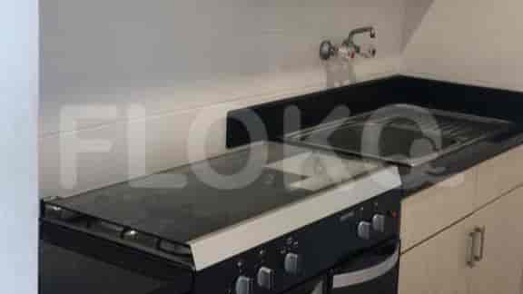 Kitchen with a stove and countertop.