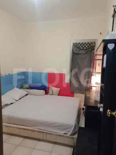 Another bedroom with a bed.