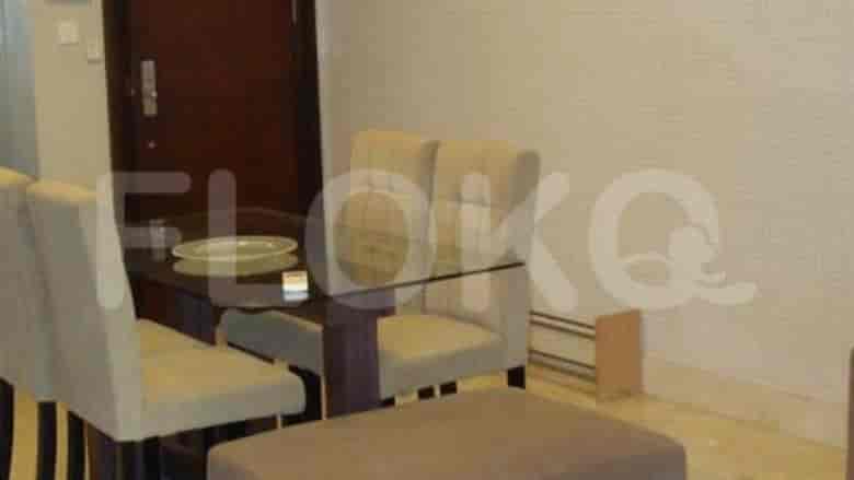 Dining area with a table and chairs.