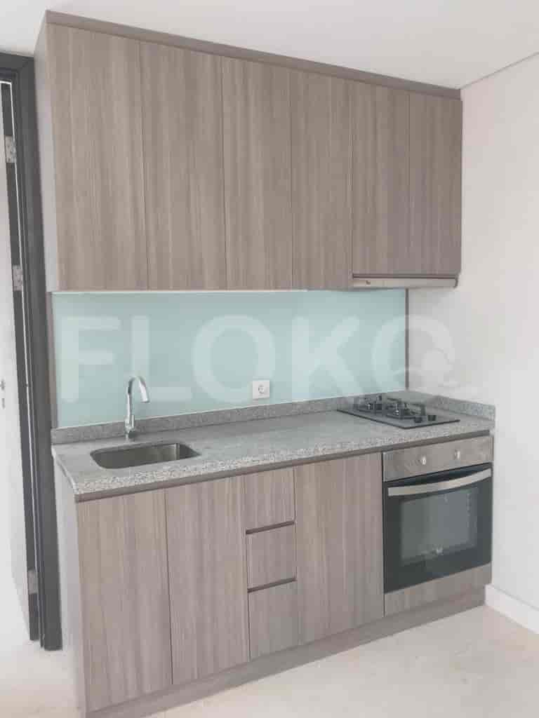 Modern kitchen featuring cabinets, countertop, and appliances.