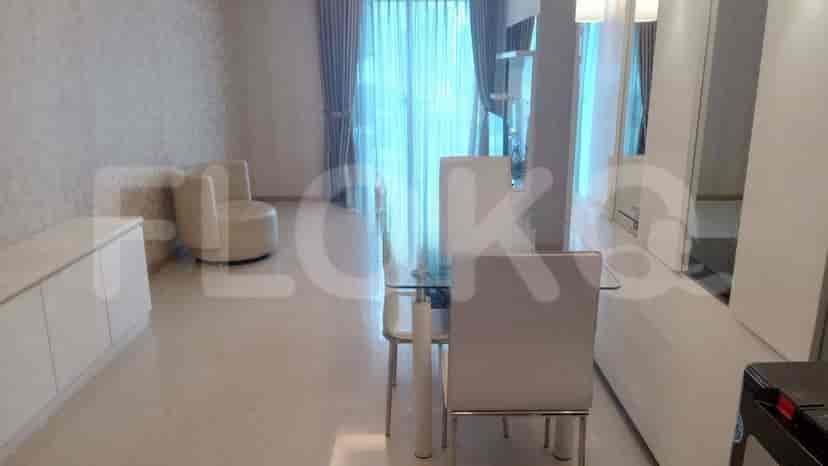 A living and dining area with modern furniture.