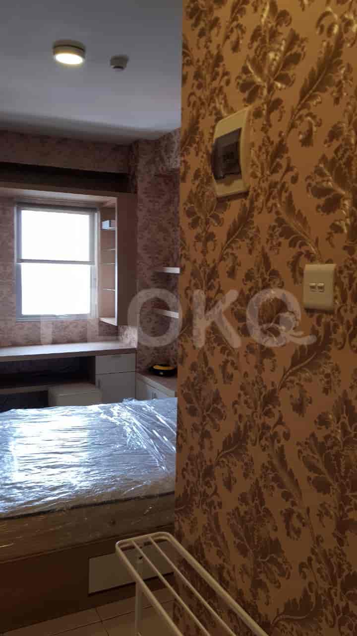 Bedroom with bed and decor.