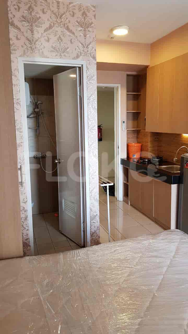 View of kitchen, bathroom and bedroom.
