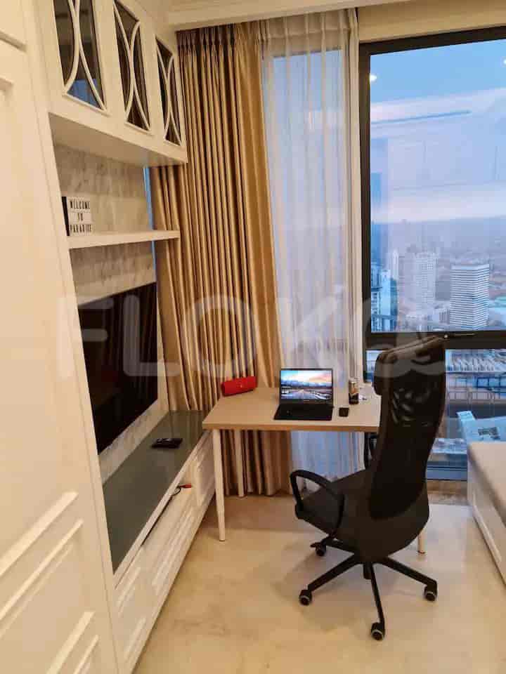 View of a desk with a window to provide natural light.