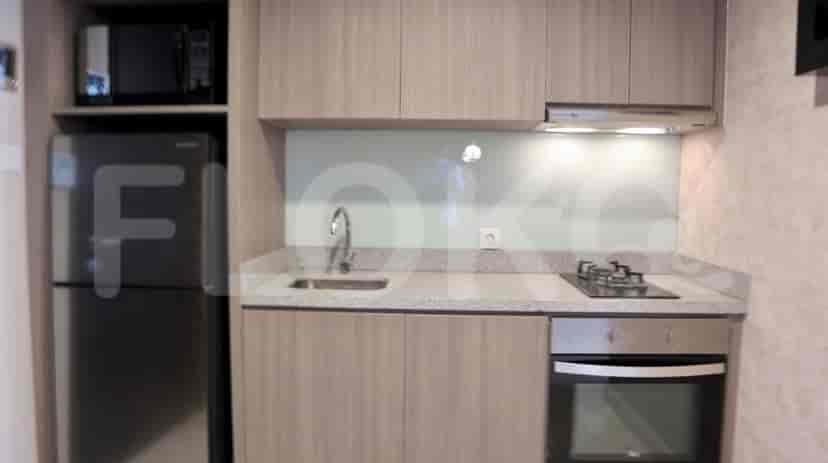Kitchen with appliances and countertop.