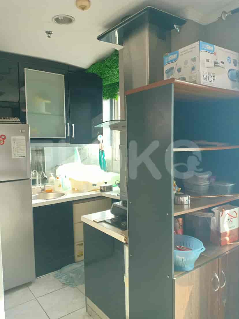 Kitchen with cabinets and appliances.
