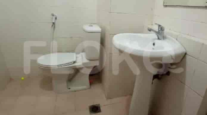 Bathroom with sink and toilet.