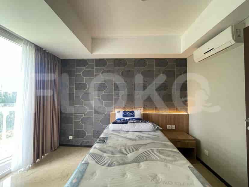 A guest bedroom with two single beds.