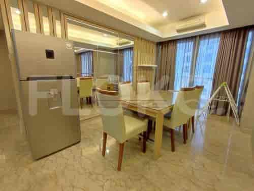 Dining area with a table and chairs.