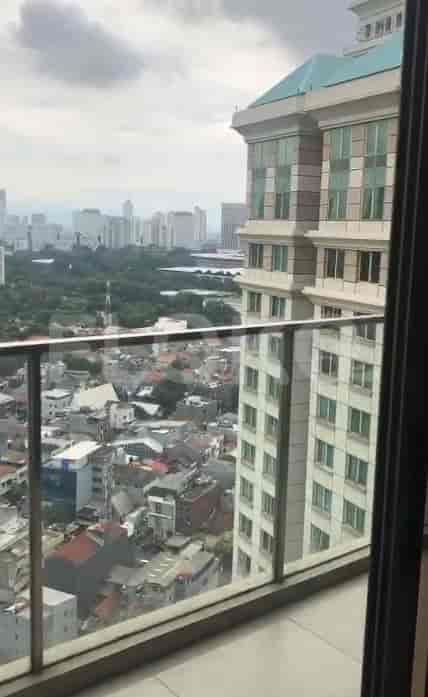 A panoramic view of the city from a balcony.