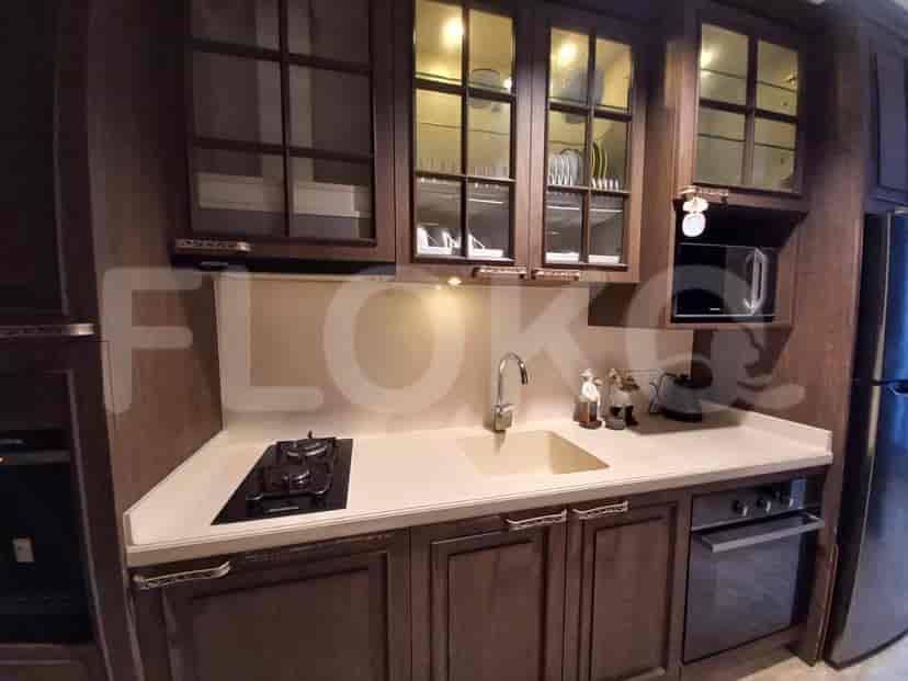 Dapur yang lengkap dengan desain modern dan fokus pada fungsionalitas dan estetika.