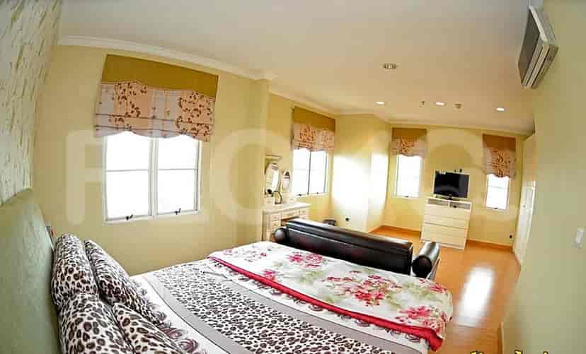 Bedroom with bed, dresser, and window.