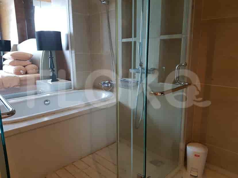 Bathroom with a bathtub and separate shower.
