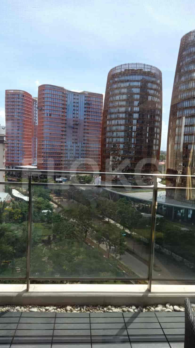 Cityscape view from a balcony.