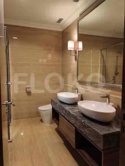 Spacious bathroom with a double sink vanity and a separate shower.
