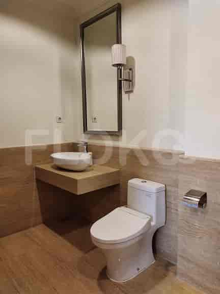 Bathroom with a toilet and a sink.