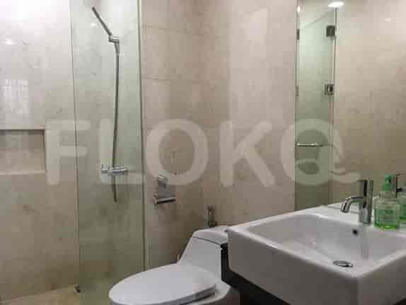 Bathroom with sink, shower, and toilet.
