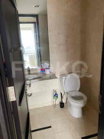 Bathroom with a toilet and sink.