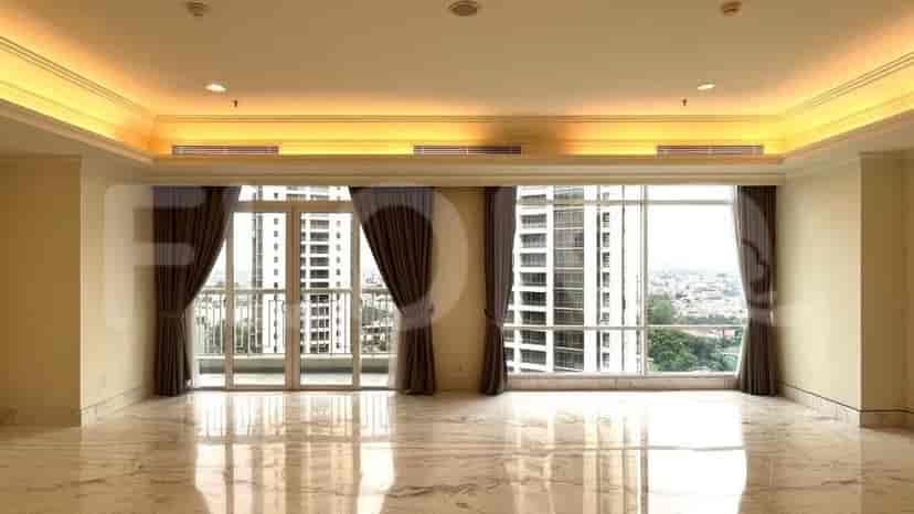 Spacious living room with marble flooring, large windows, and ceiling lights.