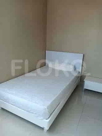 A bedroom showing a single bed.