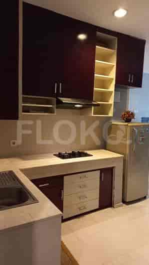 Kitchen with cabinets, appliances, and a stovetop.
