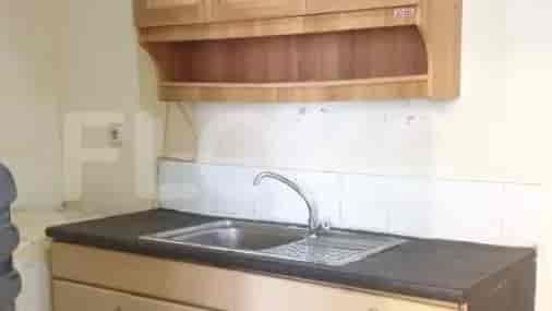 Kitchen with sink and cabinets.