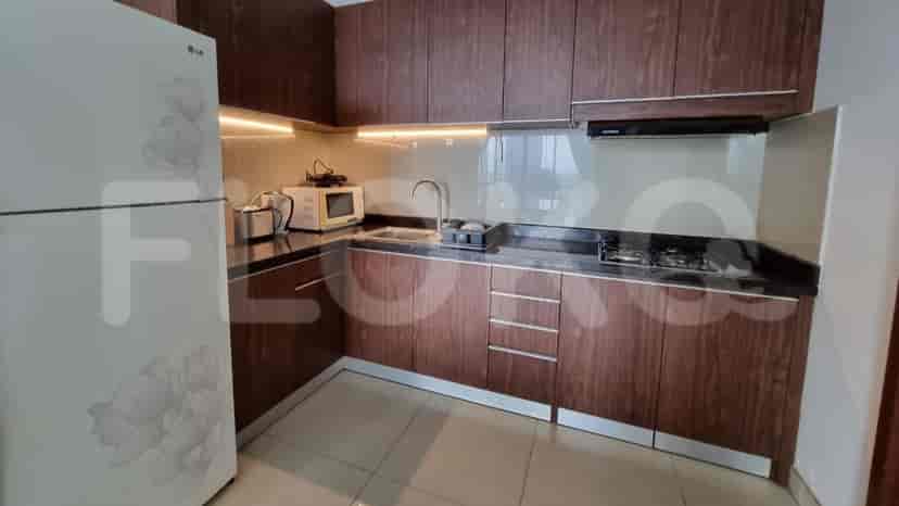 A well-equipped kitchen with wooden cabinets and modern appliances.