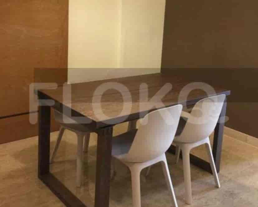 Dining table with two chairs.