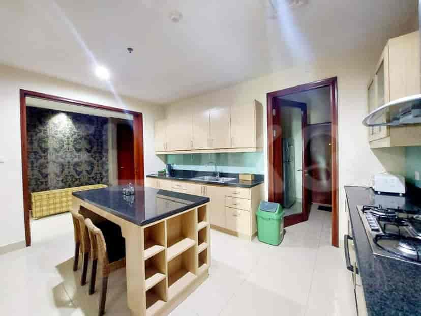 Kitchen with island and cabinets.