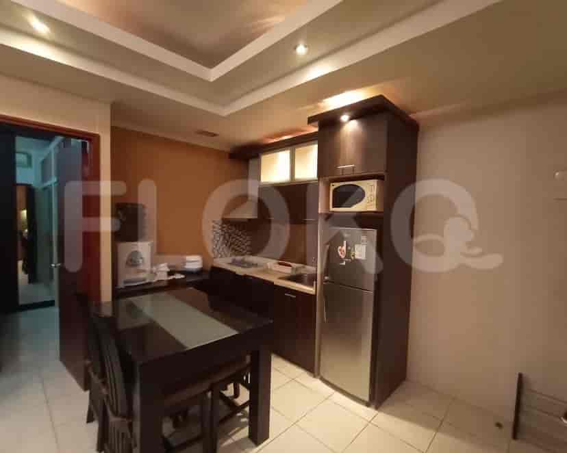The kitchen with appliances.