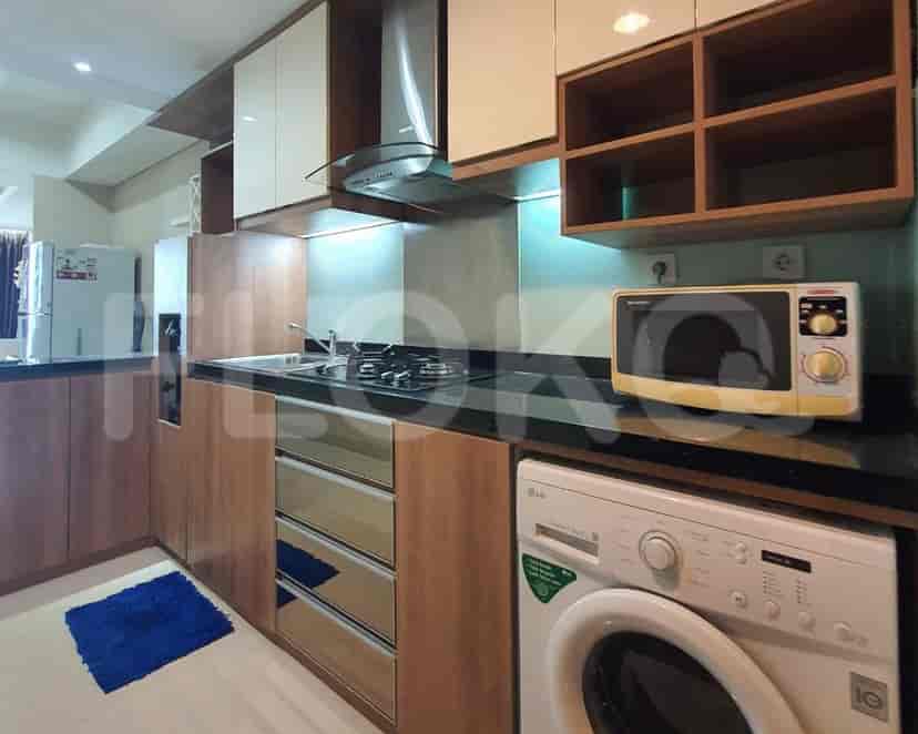 A fully equipped kitchen with modern appliances and ample storage.