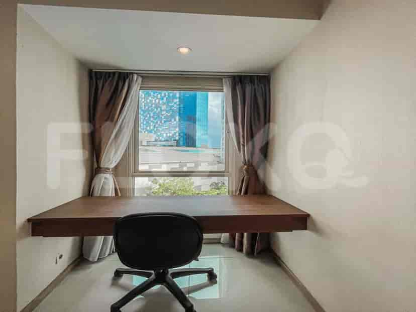 Study area with a desk and a chair.
