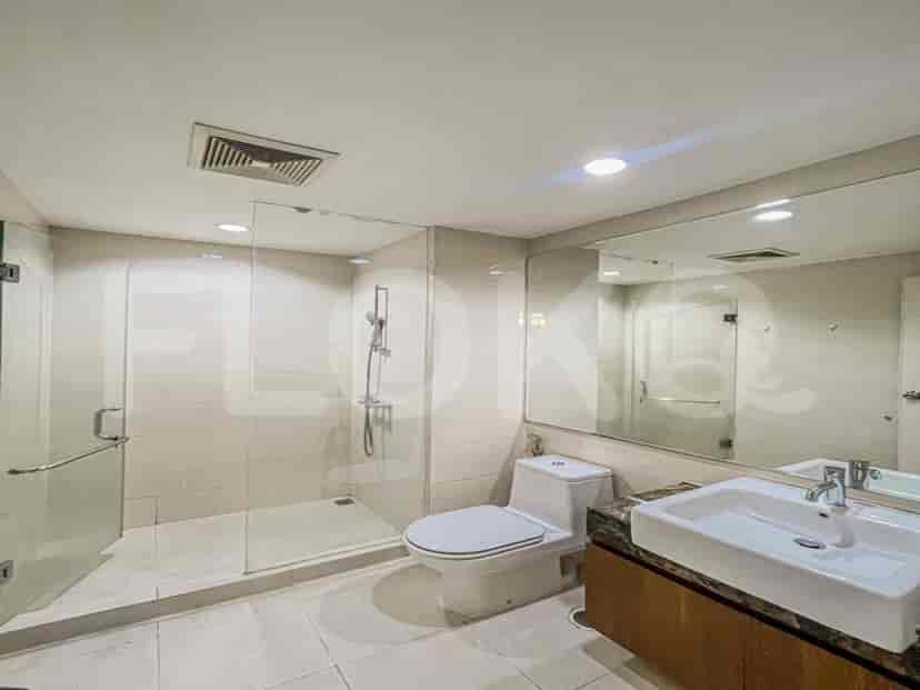 Modern bathroom with a glass shower and a sink.