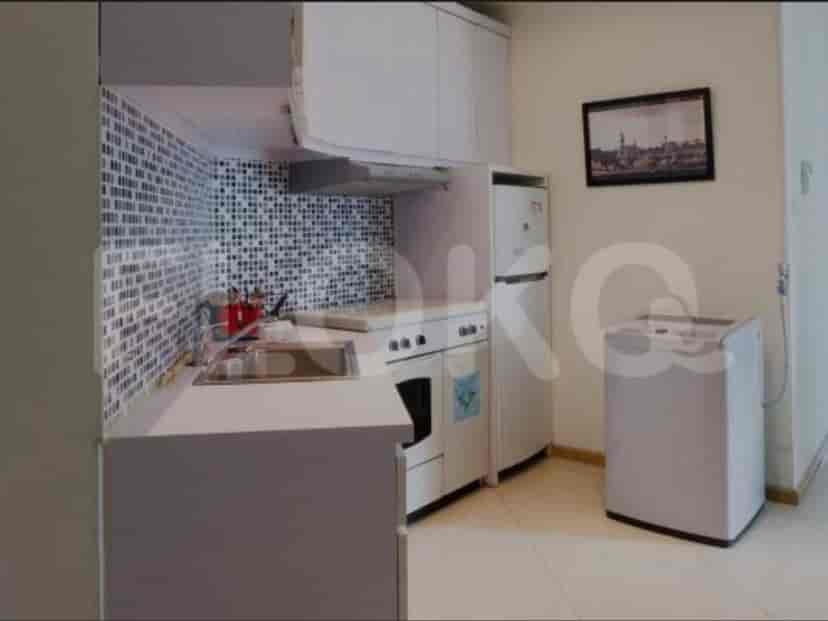 Kitchen area with appliances.