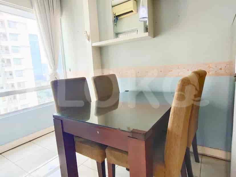 Dining area with a table and chairs.