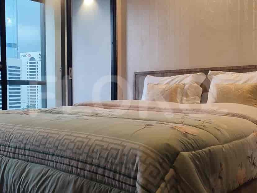 Bedroom with a bed, and a view.