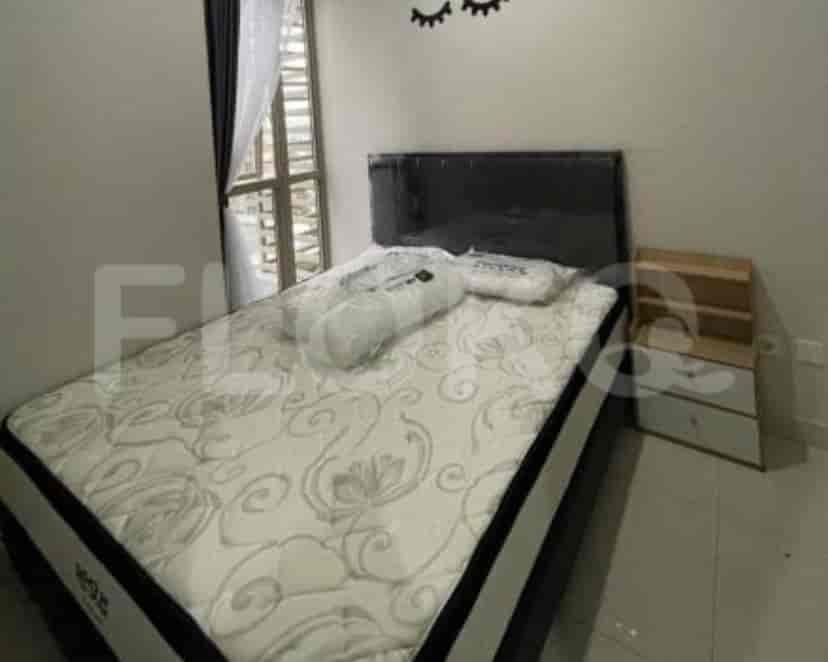 Kamar tidur dengan tempat tidur ganda, menawarkan ruang yang nyaman dan menyenangkan.