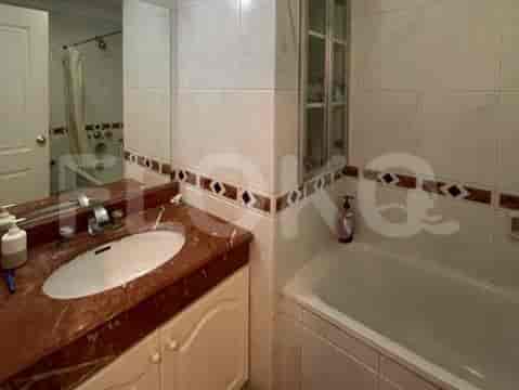 A bathroom with a sink and a bathtub.